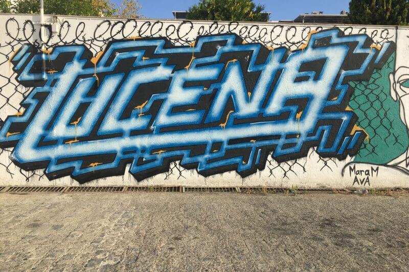 lucena painted on a wall as art graffiti
