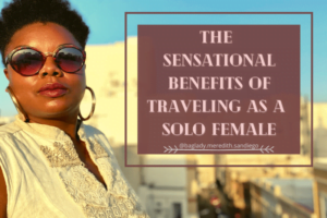 the sensational benefits of traveling as a solo female pin with Meredith in a beige outfit and beige buildings in background