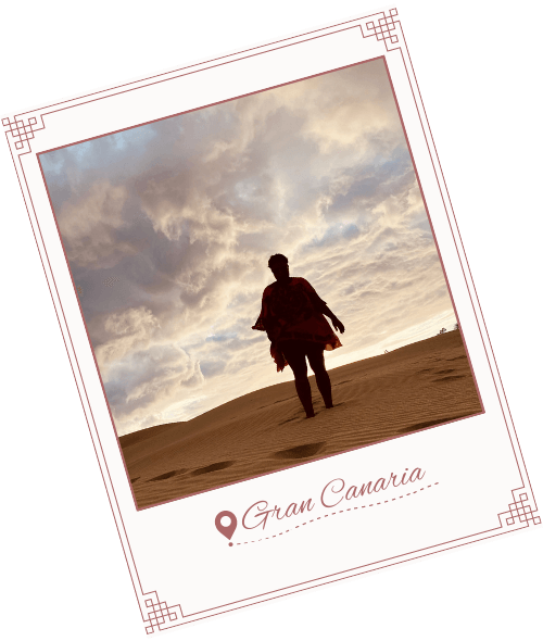 polaroid photo of meredith with a cloud silhouette behind her on the canary islands