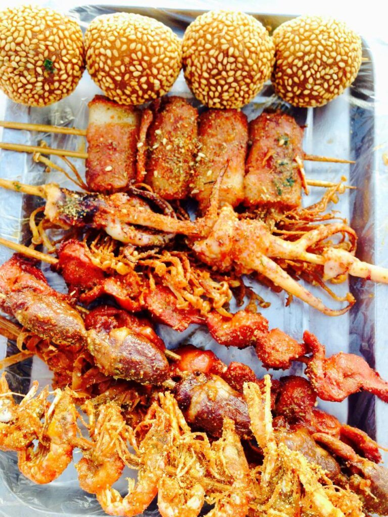 cooked street seafood skewers in china